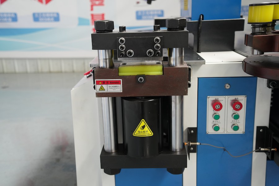 Why is it necessary to improve the design of the busbar cutting machine's hydraulic cylinder?